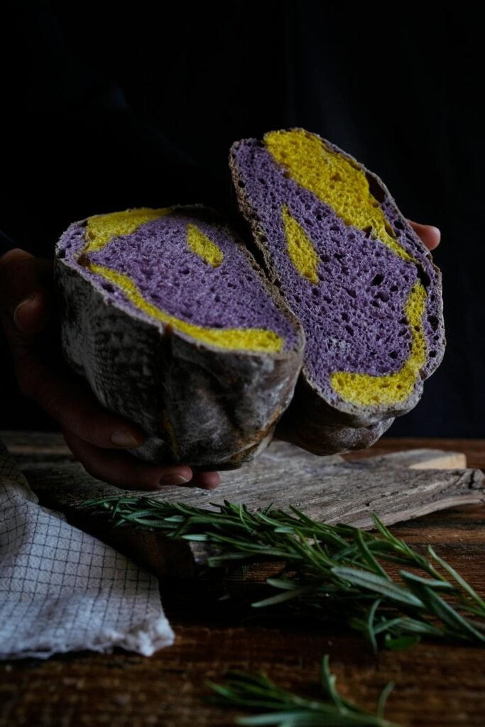 free-photo-of-colorful-artisan-bread-on-rustic-wooden-board