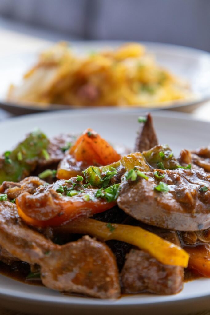 pexels-photo-31673757-31673757 Savor this flavorful beef stir fry with colorful bell peppers, a perfect meal.