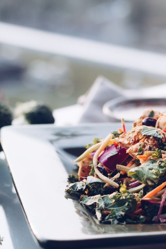 10 Easy No-Cook Dinner Ideas for Busy Weeknights 1 Close-up of a colorful vegetable salad with kale, perfect for a healthy meal.